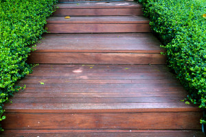 Bigstock-Wood-Stair-Way-On-Green-Garden-35981329-300x199